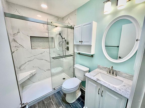 En suite primary bathroom walk-in shower.