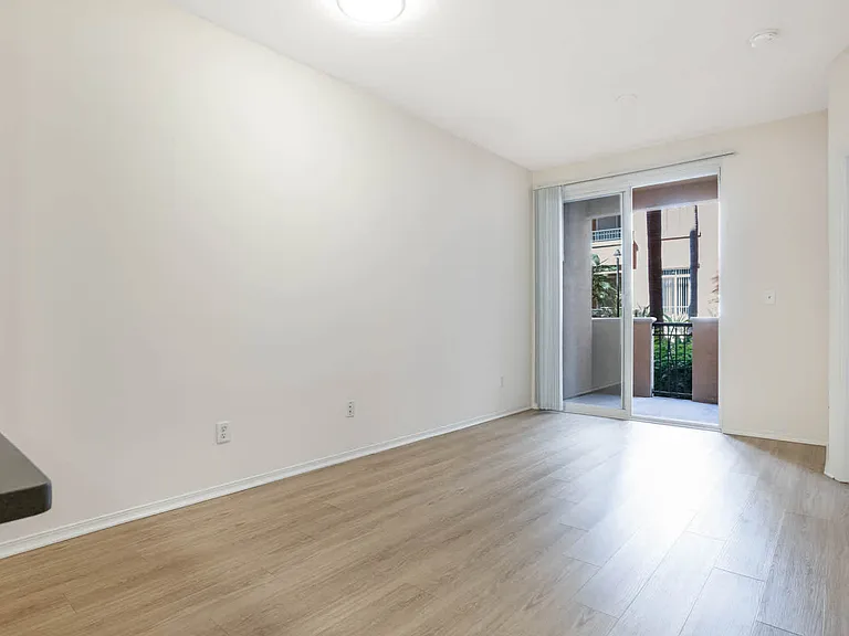 Living Room with Hard Surface Flooring and Balcony
