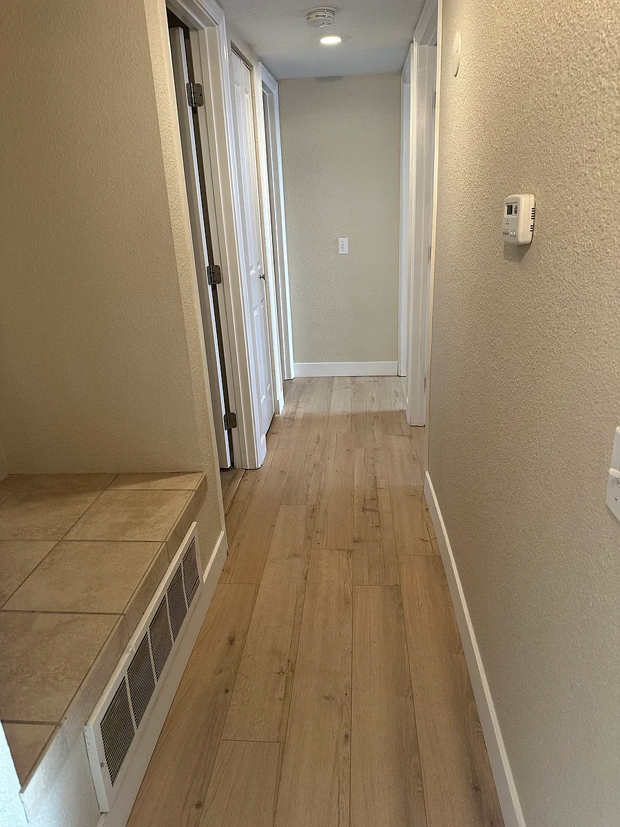 Front hallway to bedrooms - 9867 E Peakview Ave #E06