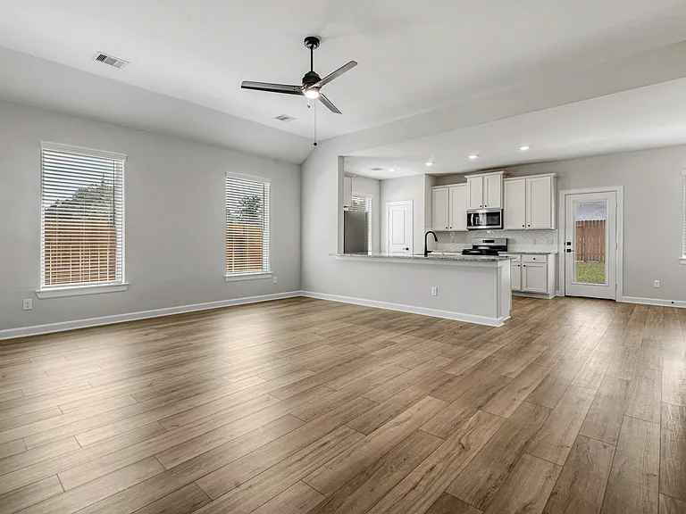 The kitchen overlooks the family room