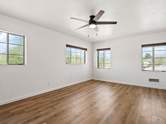 Large master bedroom with mountain views
