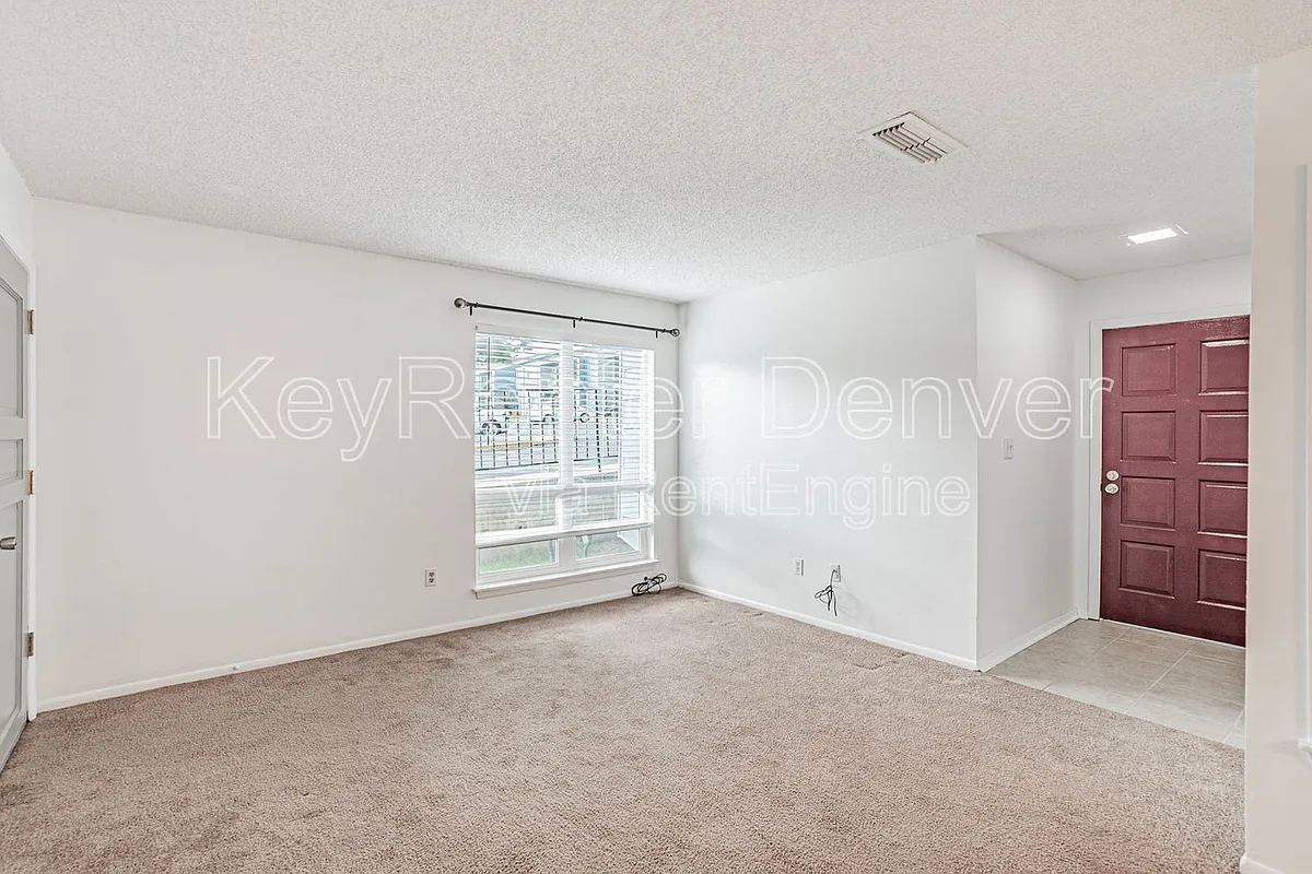 Building Photo - 7185 S Gaylord St #E13