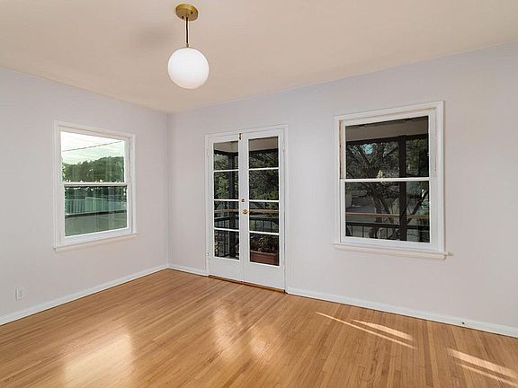 Front Bedroom w/ Balcony #2