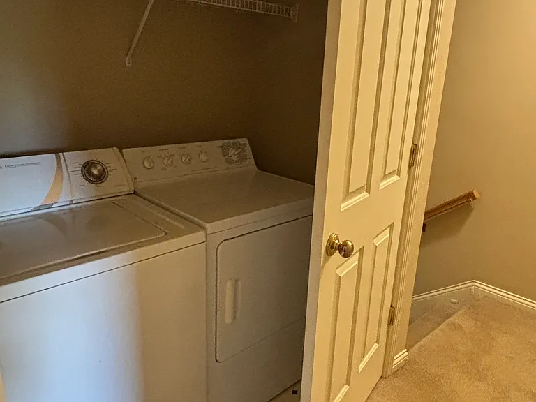Laundry conveniently located upstairs near bedrooms.
