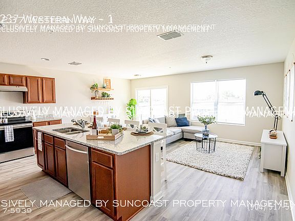 5th image of 9237 Western Way #1