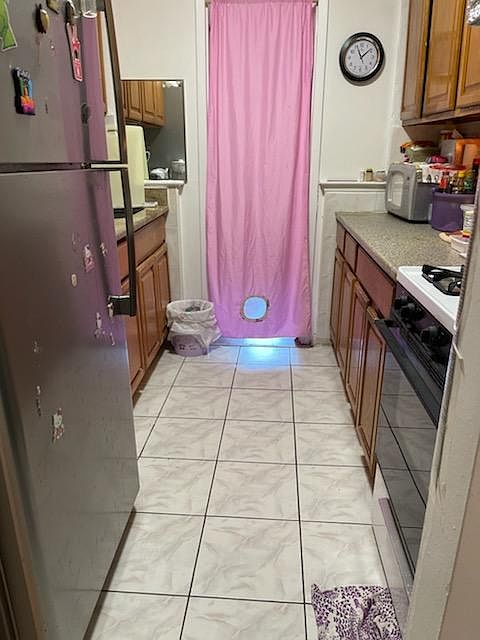 2nd image of 14348 Roosevelt Ave #3