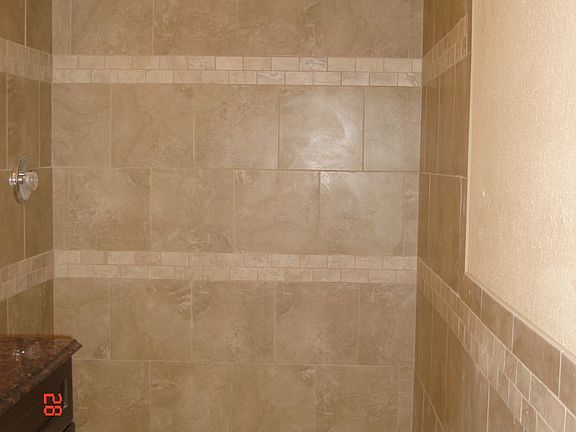 Ceramic tile throughout