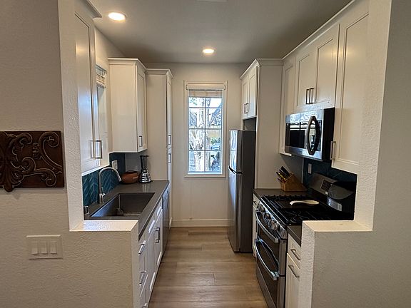 3rd image of 10840 Sabre Hill Dr Unit 219