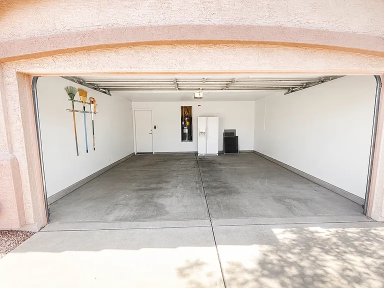 2 car garage. Drink fridge included.