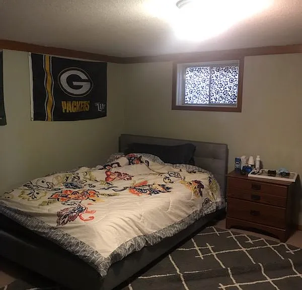 One of two basement bedrooms