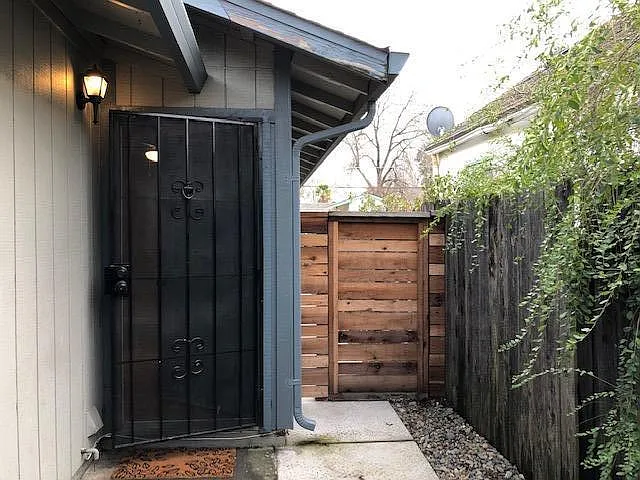 Front entrance with side gate to the back yard