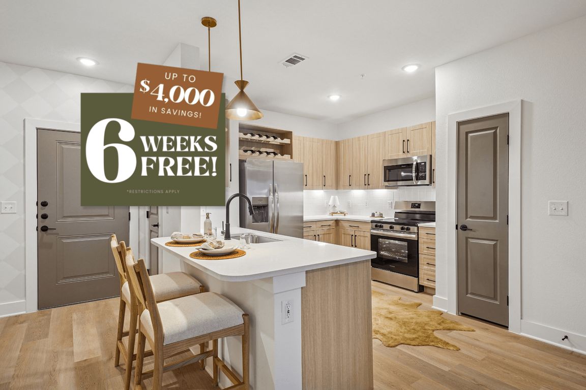 Kitchen with Quartz Countertop and Stainless Steel Appliances