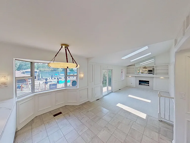 Eat-in Kitchen with Family room in background