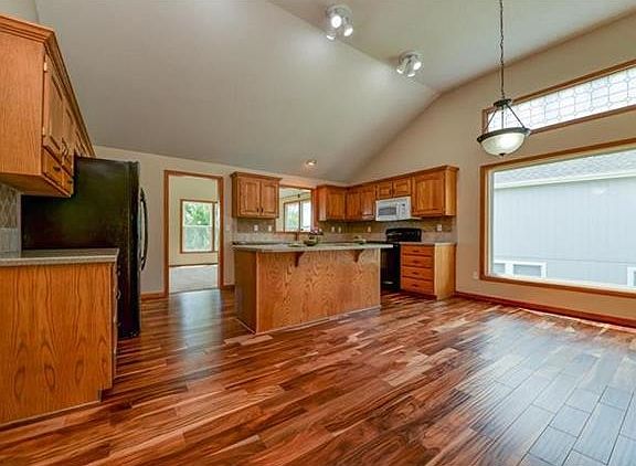 Beautiful New Flooring In This Large Kitchen/Dining Space