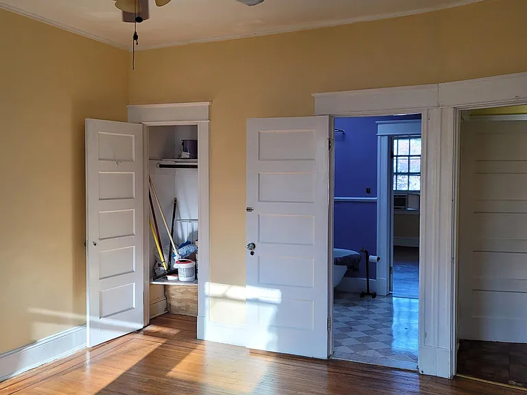 1 of 3 closets and unsuited bathroom.