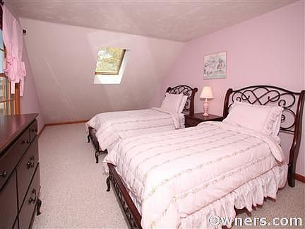 Bedroom with walk-in closet