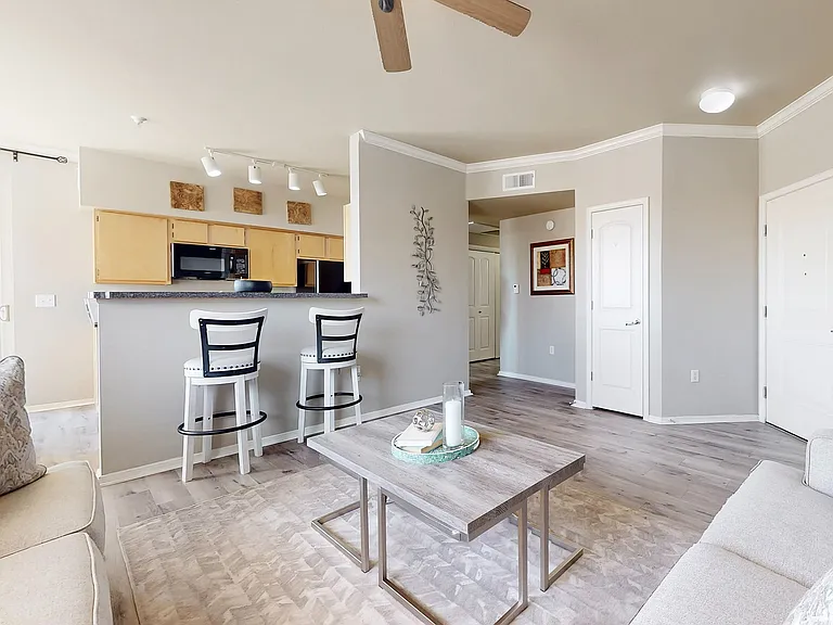 Experience the elegance of this open-concept living area, perfect for relaxation and entertaining.