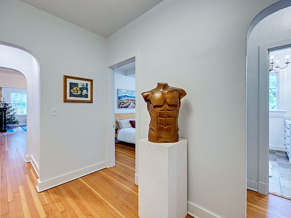 Striking entryway framed by graceful coved archways.