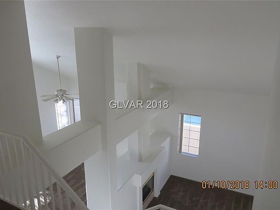 Beautiful vaulted ceiling over living and family rooms.