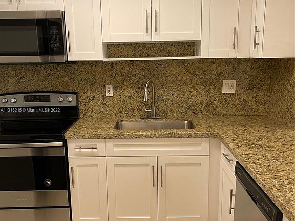 4th image of 6090 W 18th Ave APT 332