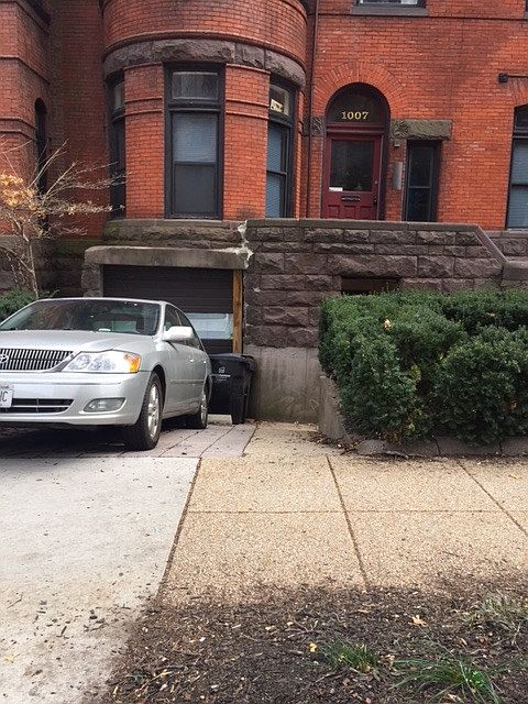 At end of driveway is entrance to unit