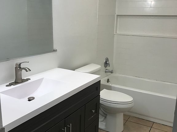 Main bathroom. Updated Vanity, Toliet and Shower/Tub Combo