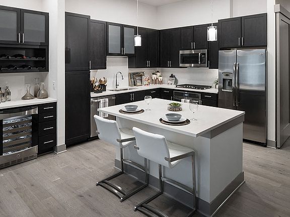 Granite Kitchen Countertops with Contemporary Wood Cabinetry