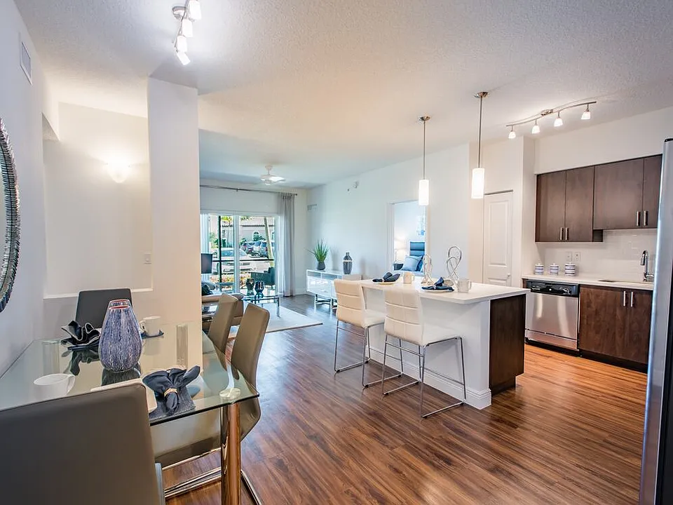 Kitchen and dining area with hard surface flooring