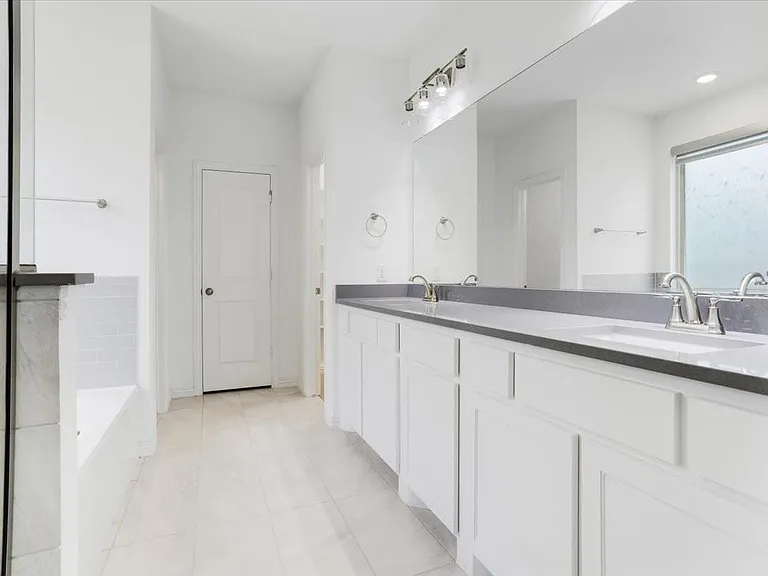 His and hers sinks with ample counter space.