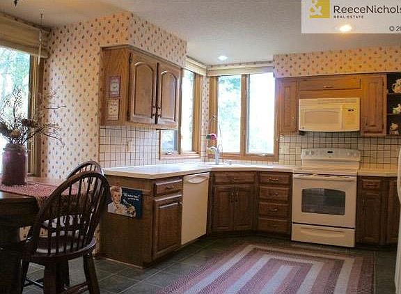 Large eat-in kitchen with lots of windows