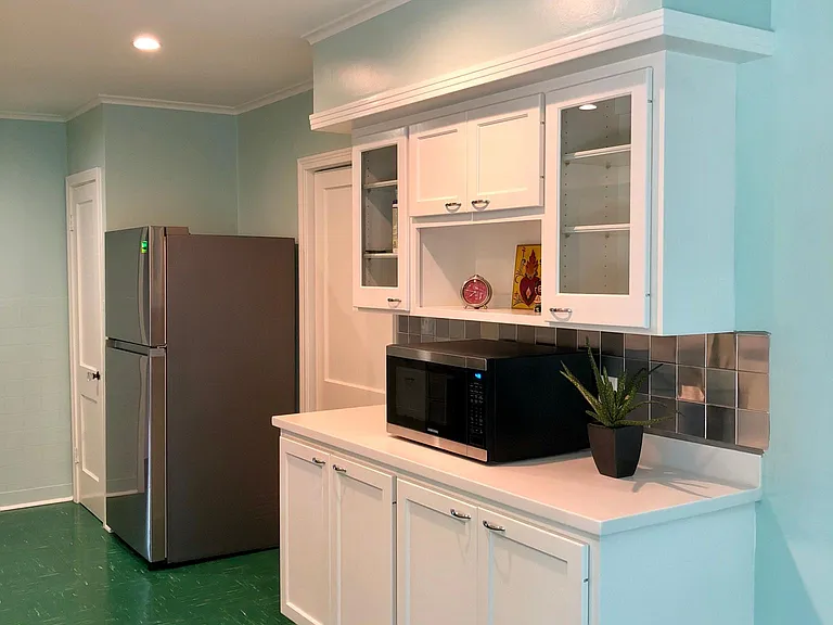 Buffet with Large Slide-Out Pots/Pans Drawers. Stainless Steel Refrigerator.