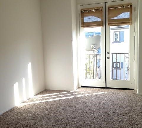 master bedroom with balcony