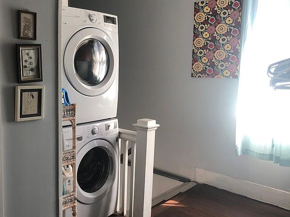 Hallway with washer and dryer