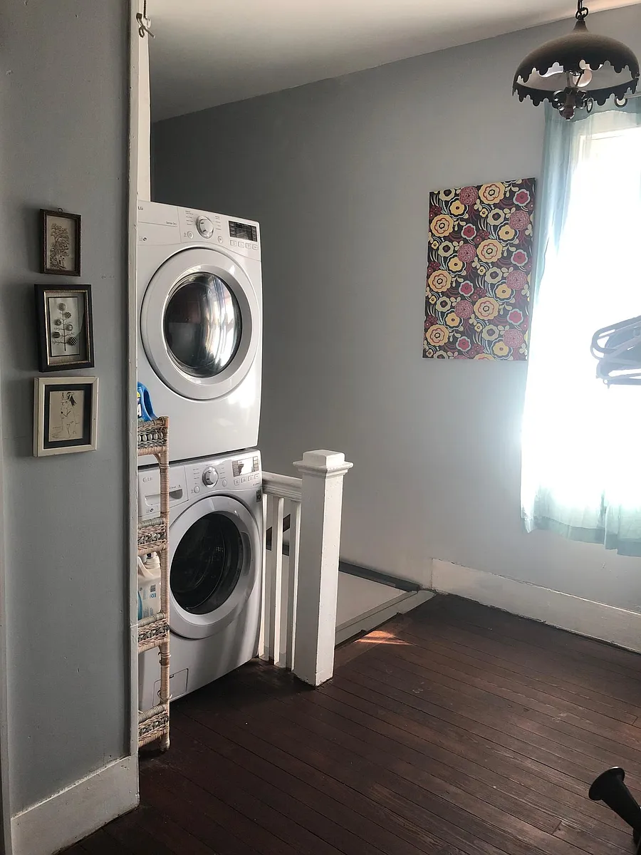 Hallway with washer and dryer - Opelousas Ave