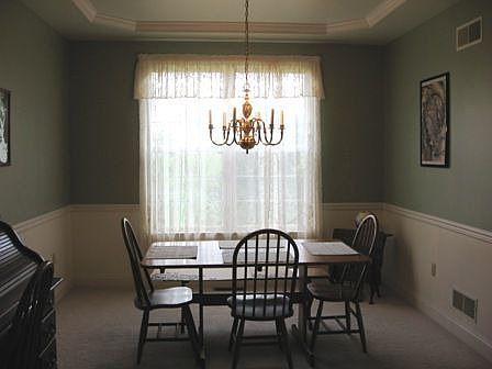 Formal Dining Room With Tray Ceiling With Molding, Chairrail, 9-Foot Ceiling