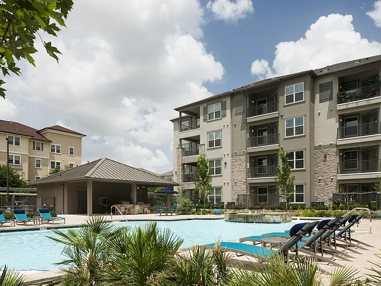 Relax by the beautiful resort-style pool at McDermott 55.