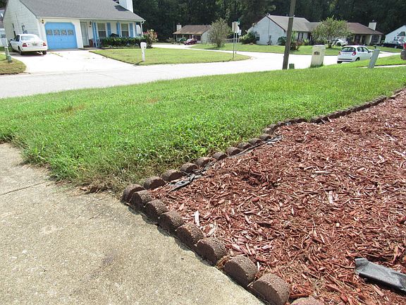Front lawn + flowerbed