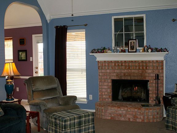 New gas logs in Fireplace-LR equipped for surround sound
