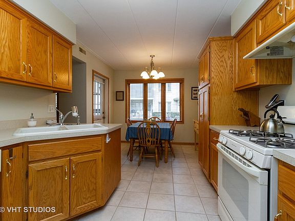 5th image of 13918 E Leamington Dr Unit 402