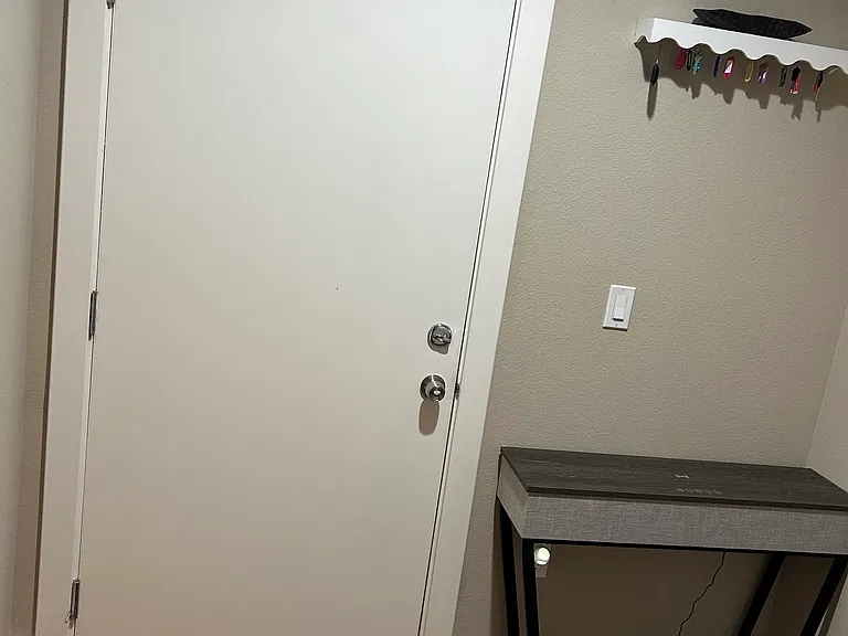 Bottom level Door to garage with keys and garage openers
