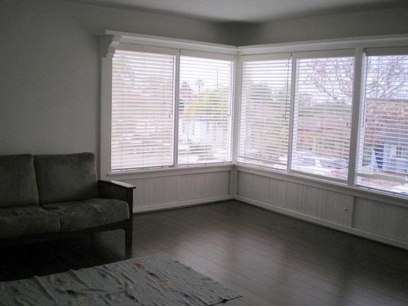 lots of light in the large 15 ft x 18 ft living room. Vents