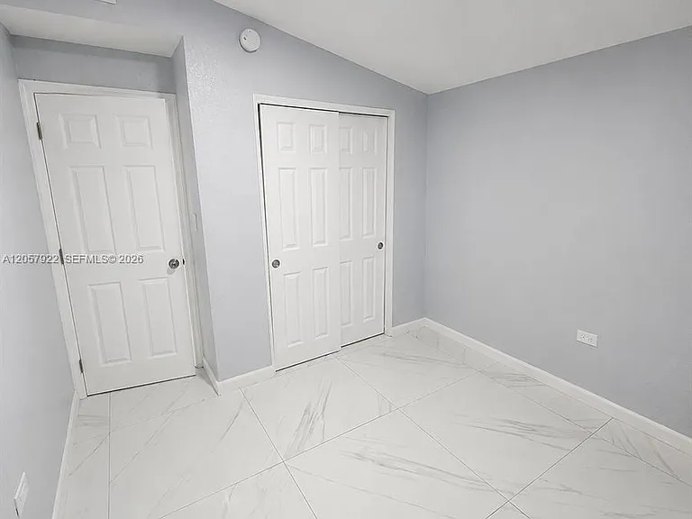 552 NE 161st St — Photo 13