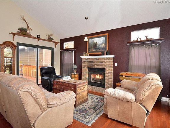 Cozy gas fireplace for those winter nights.  Great access to a large deck for th