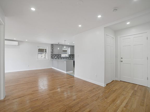 Entrance, dining area, kitchen open to the living area