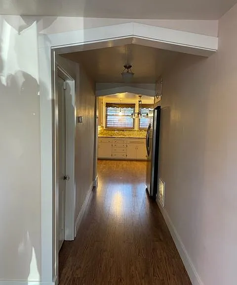 View from front door (fridge in hallway)