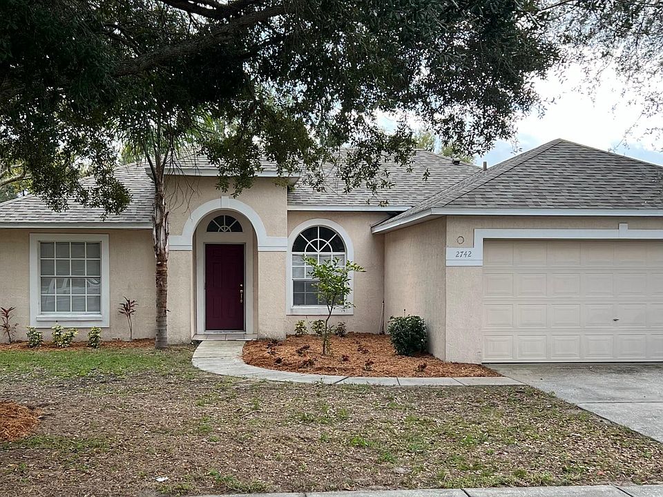 Front: single family home, 3/2 with 2 car garage and fenced back yard