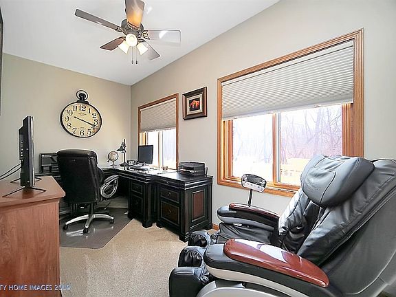 Fabulous views from the office/den overlooking the back wooded yard.