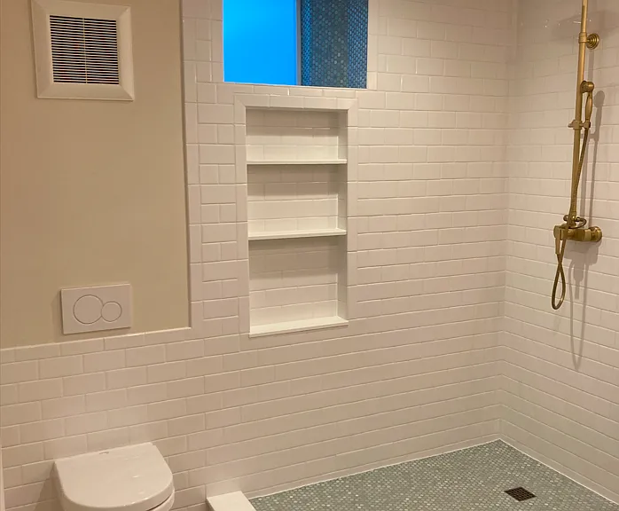 Basement Bathroom (Shower has newly installed custom glass)