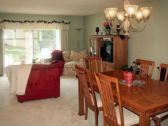 South facing open living with sliding door to private patio and gorgeous view