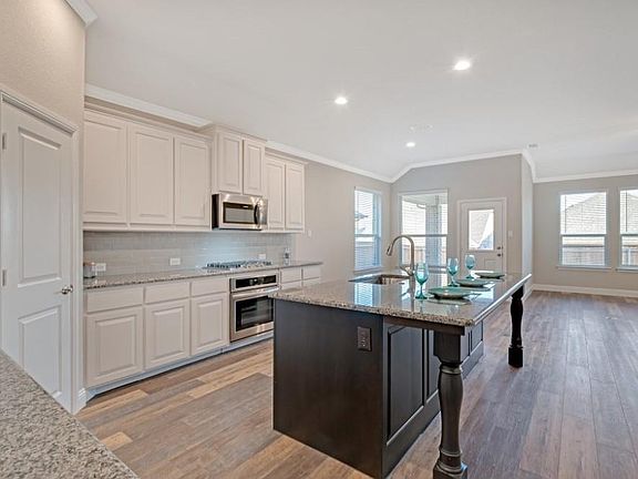 All photos shown here may not depict the specified home & features included are for illustration purposes only